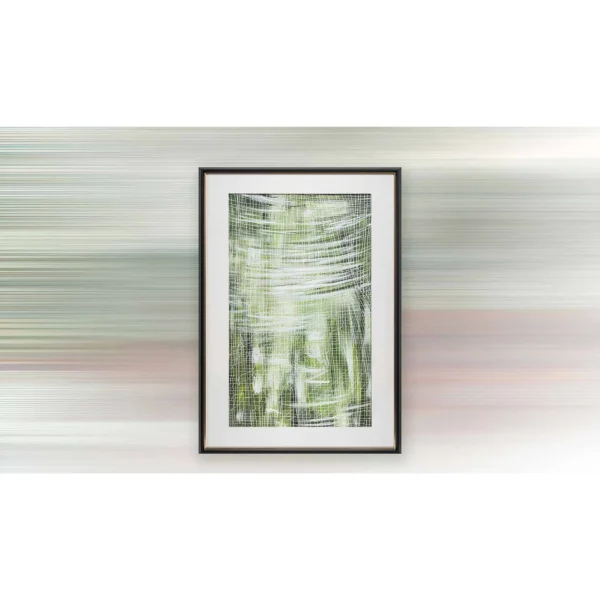Green Reed Reflection Painting in Black Frame, 85 x 120 cm — in a room setting