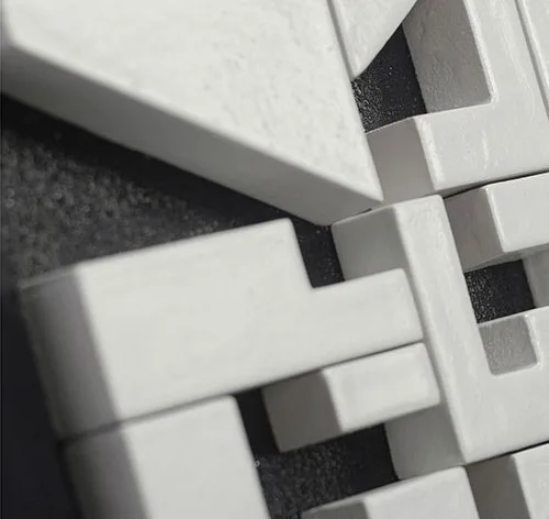 Black and White Tile Puzzle Relief, 35 x 35 cm in black — detail