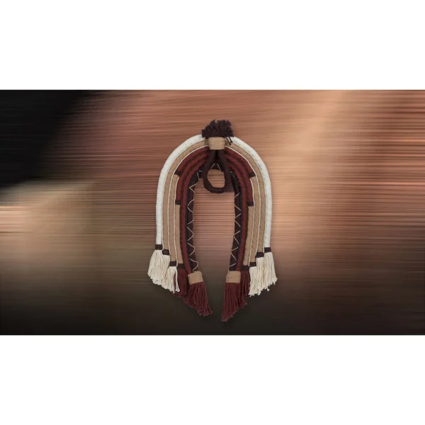 Woven Arch Fibre Wall Hanging in burgundy — in a room setting