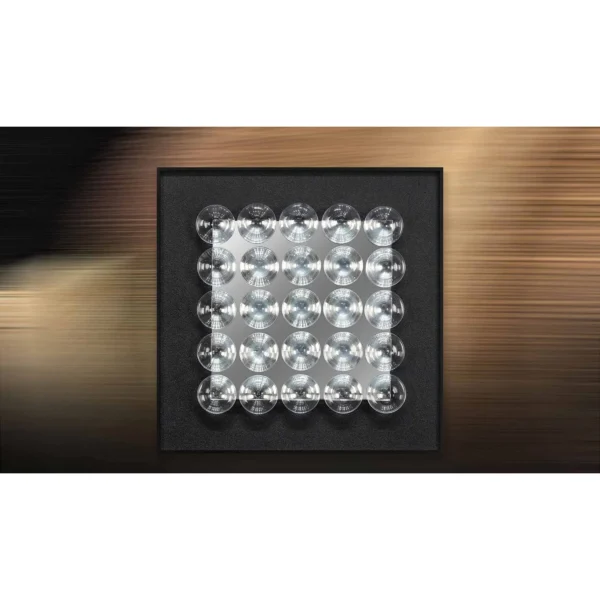Silver Dome Grid Relief on Black, 50 x 50 cm in silver — in a room setting