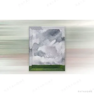 Storm Cloud Over Green Field Painting in slate — in a room setting