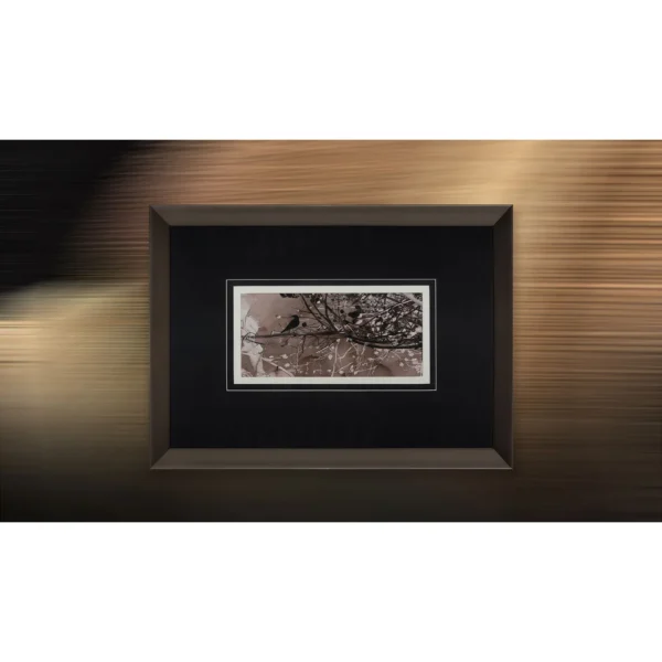 Small Bird on Branch Ink Art in Black Frame, 55 x 40 cm — in a room setting