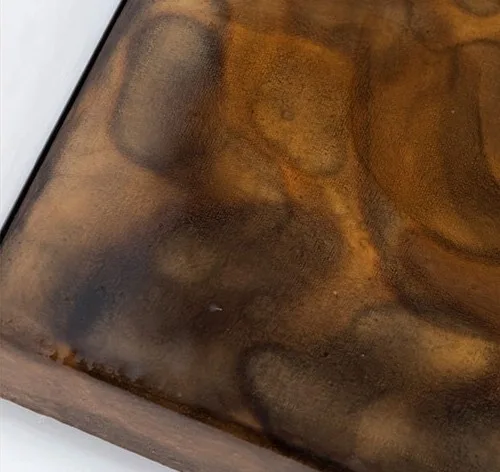 Amber Spiral Glazed Wall Art, 60 x 60 cm in rust — detail
