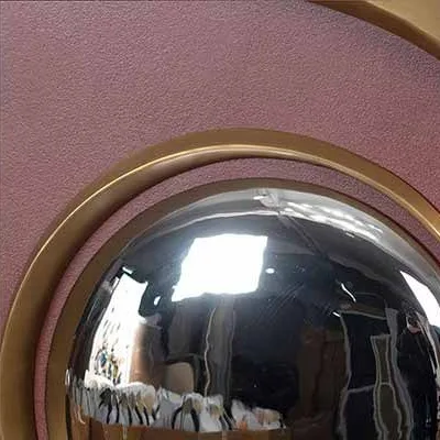 Burgundy Disc with Brass Rings and Convex Mirror, 97 x 88 cm in burgundy — detail