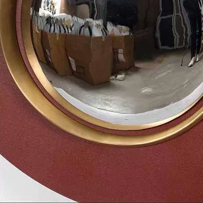 Burgundy Disc with Brass Rings and Convex Mirror, 97 x 88 cm in burgundy — detail