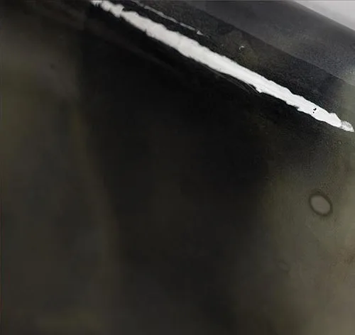 Charcoal Ink Bloom Glazed Slab, 90 x 90 cm in black — detail