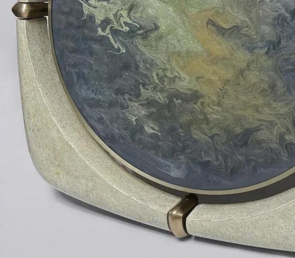 Marbled Blue Disc in Speckled Cream Frame with Brass Clips — detail