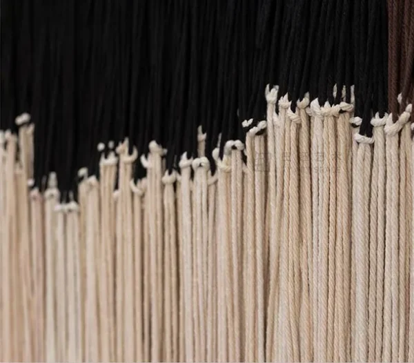 Fringed Fibre Wall Hanging in sand — detail