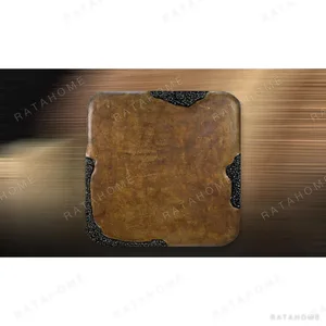 Rust Glazed Slab with Black Speckle Corners, 120 x 120 cm in rust — in a room setting