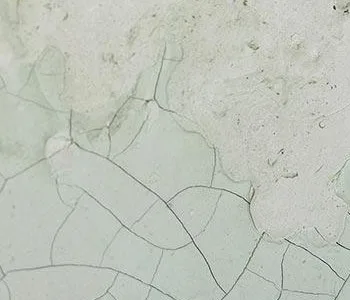 White Crackle Plaster Panel on Pale Green, 40 x 55 cm in ivory — detail
