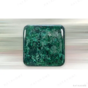 Emerald Marbled Glazed Slab, 100 x 100 cm in olive — in a room setting