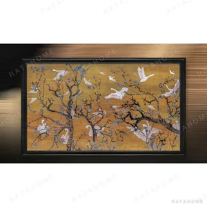 Wide Cranes and Blossom in brushed brass — in a room setting