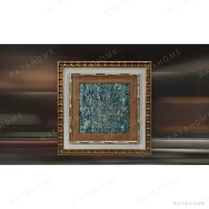 Mother of Pearl Bird in Wood and Gold Frame, 60 x 60 cm — in a room setting