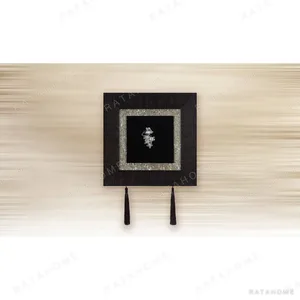 Small Silver Motif in Black Frame with Tassels, 30 x 30 cm — in a room setting