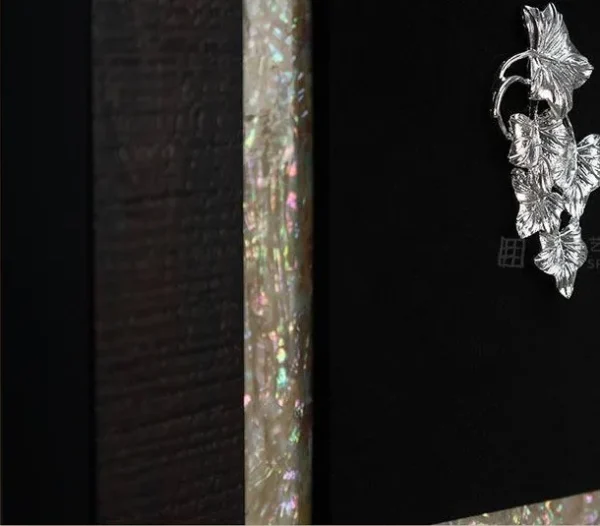 Small Silver Motif in Black Frame with Tassels, 30 x 30 cm — detail