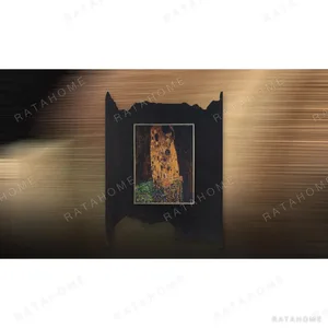 Golden Embrace Print on Torn Black Panel, 60 x 80 cm in brushed brass — in a room setting