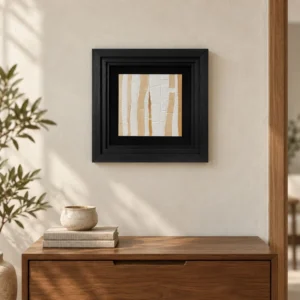 Small Torn Paper Strips in Black Frame, 40 x 40 cm — front view