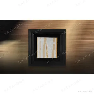 Small Torn Paper Strips in Black Frame, 40 x 40 cm — in a room setting