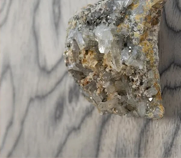 Small Stone on Marbled Wood in Ribbed Silver Frame, 60 x 60 — detail