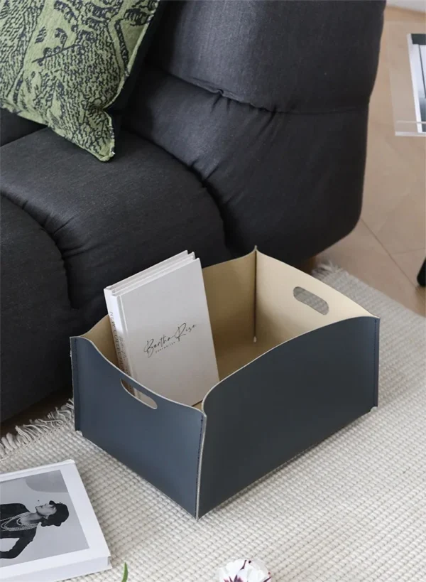 Cream Leather Rectangular Storage Box with Cut-Out Handles in oatmeal — in a room setting