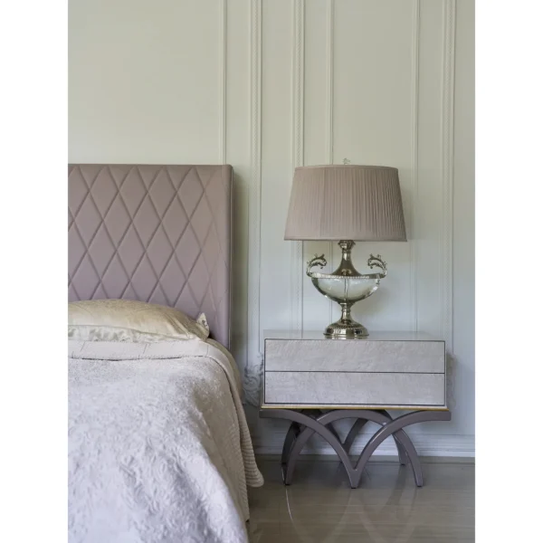 Lavender Leather Diamond-Stitched Bed with Nightstands in plum — in a room setting