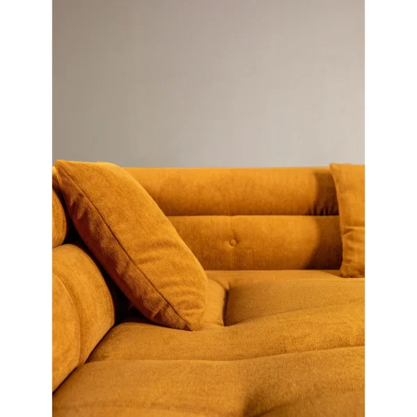Caramel Cloud Modular Sofa in rust — in a room setting