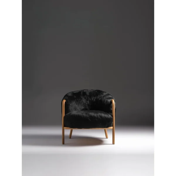 Ink Wave Wood Frame Lounge Chair in Black Fur — in a room setting