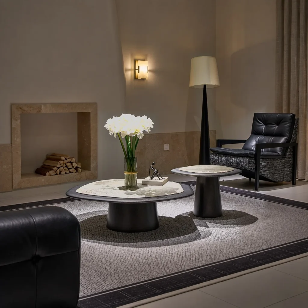 Monet Garden Stone Nesting Coffee Tables with Rolled Edges in rose stone — front view