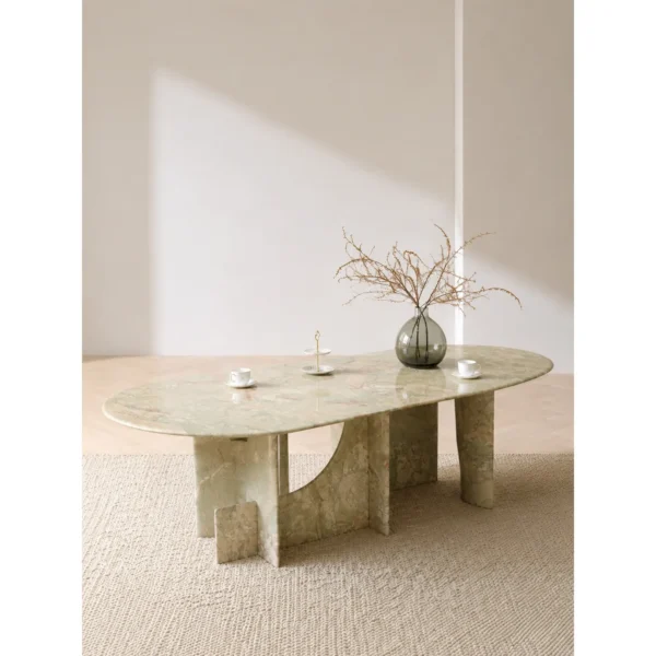 Monet Garden Green and Pink Stone Oval Dining Table in olive — in a room setting