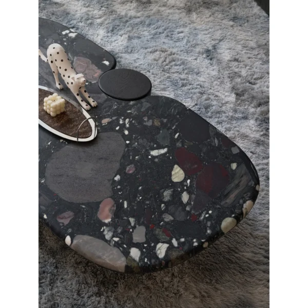 Moonlit Stars Marble Pebble Coffee Table Set in black — in a room setting