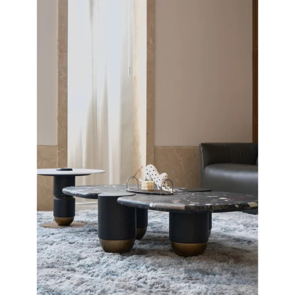 Moonlit Stars Marble Pebble Coffee Table Set in black — in a room setting