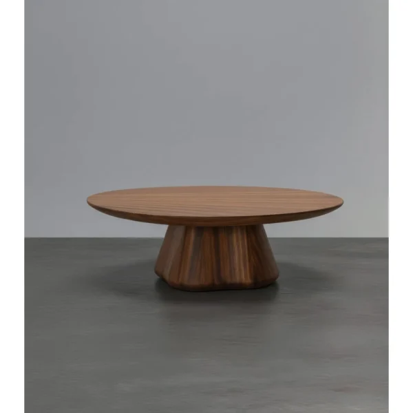 Fia Round Walnut Coffee Table on Sculpted Organic Base in walnut — in a room setting