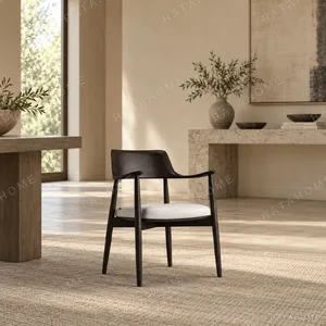 Moma Black Solid Wood Armchair in black — in a room setting