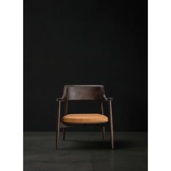 Moma Black Solid Wood Armchair in black — in a room setting