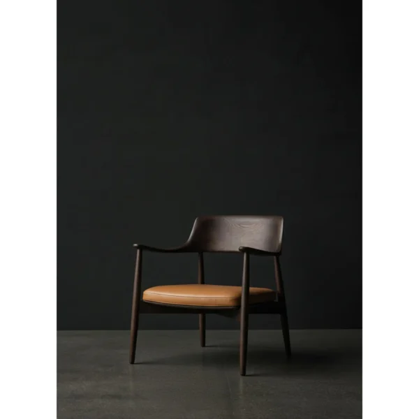 Moma Black Solid Wood Armchair in black — in a room setting