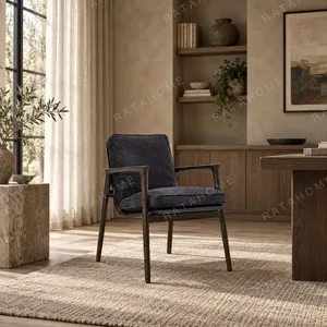 Percher Solid Wood Armchair in Navy Saddle Leather — in a room setting