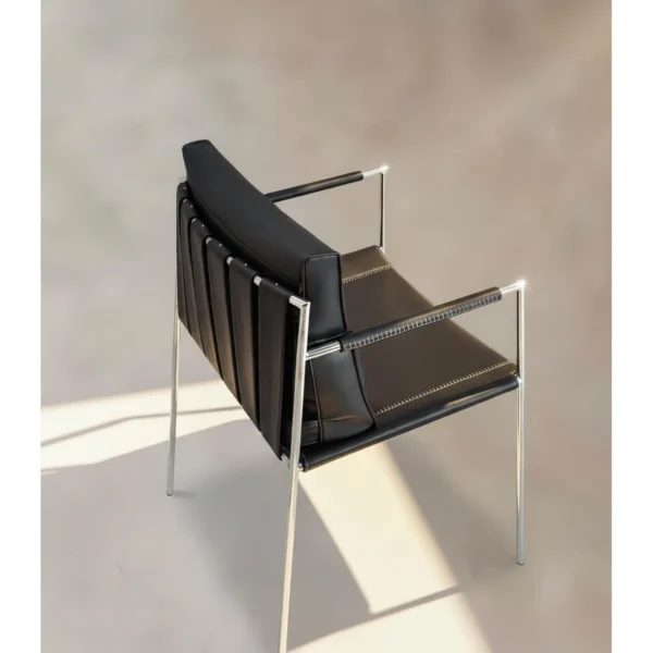 Stalform Black Leather Lounge Chair on Square Steel Frame in black — in a room setting