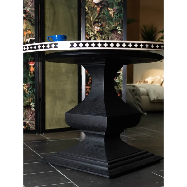Mother-of-Pearl Inlaid Round Dining Table in black — in a room setting