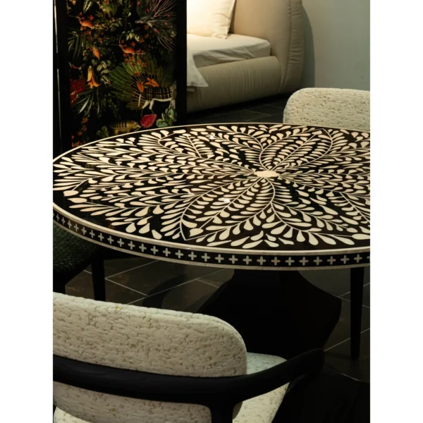 Mother-of-Pearl Inlaid Round Dining Table in black — in a room setting