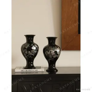 Black Glaze Vases with Mother-of-Pearl Inlay, Pair in black — in a room setting