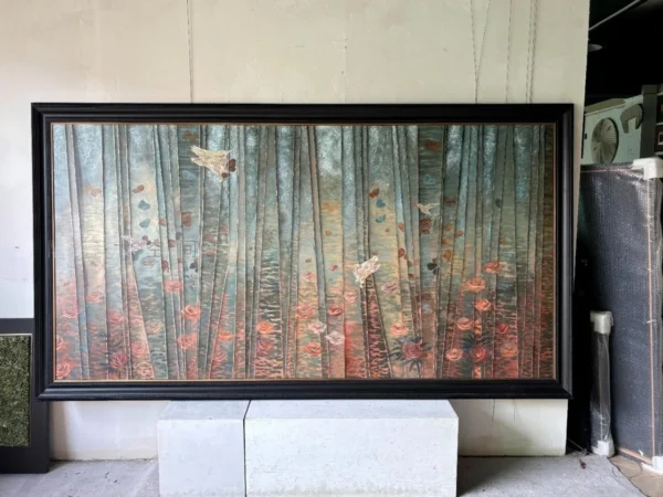 Mother of Pearl Forest Wall Art in Wide Black Frame — in a room setting