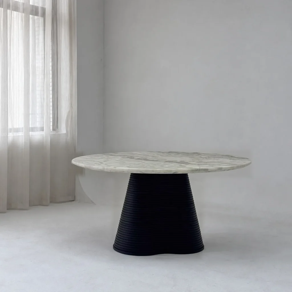 Movement Round Marble Table on Wave-Layered Black Base in ivory — front view