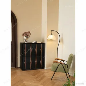 Moying Black Chest with Carved Diamond Panels in black — in a room setting