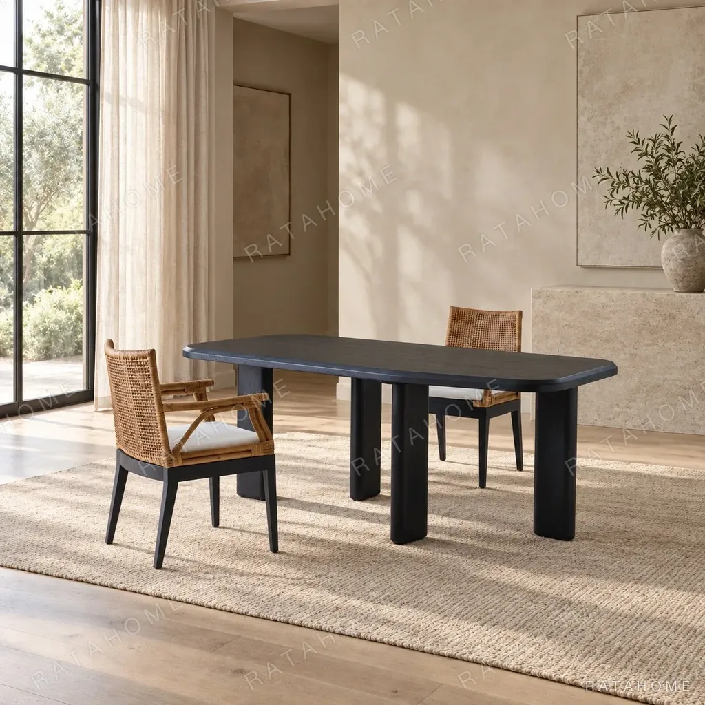 Moyu Black Dining Table with Cane Armchairs in black — in a room setting