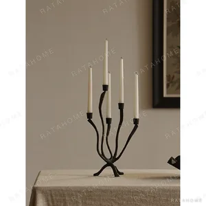 Five-Arm Vine Iron Candelabra in Matte Black — in a room setting