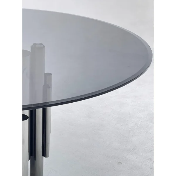 Grey Glass Round Table on Mirror-Steel Column Cluster in slate — in a room setting