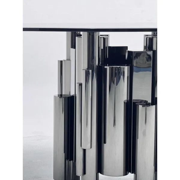 Grey Glass Round Table on Mirror-Steel Column Cluster in slate — in a room setting