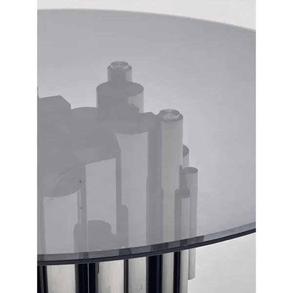 Grey Glass Round Table on Mirror-Steel Column Cluster in slate — in a room setting