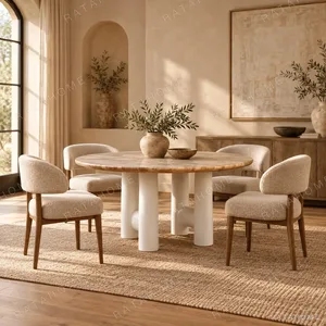 Elephant-Leg Round Dining Table in Wood and Limestone Finish — in a room setting