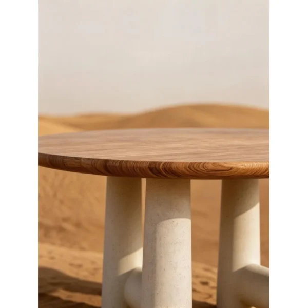 Elephant-Leg Round Dining Table in Wood and Limestone Finish — in a room setting